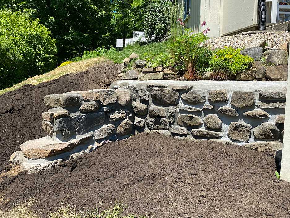 Cobble Stone Retaining Wall and Regrading detail