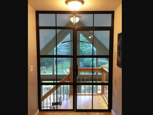 Custom Glass & Steel Door by Savvy Custom Builders