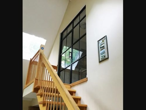 Custom Glass & Steel Door Panel by Savvy Custom Builders