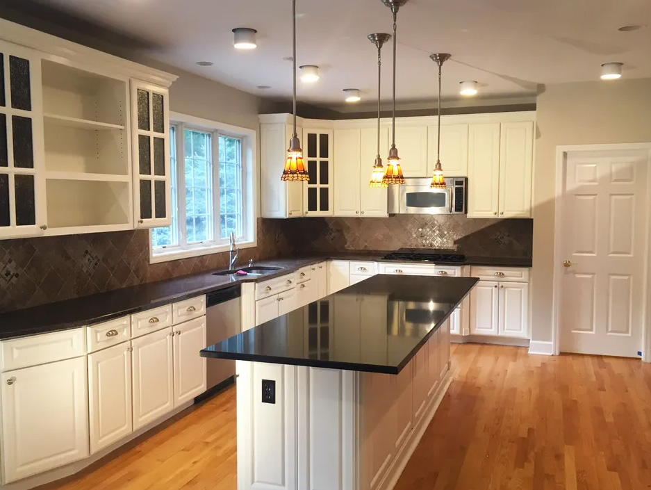 Kitchen Cabinet Painting by Savvy Custom Builders