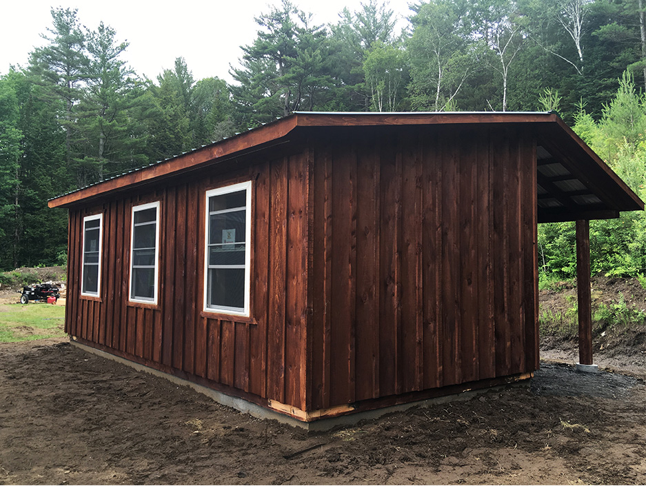 Back of Stained Board & Batten Amish-Built Studio Shed