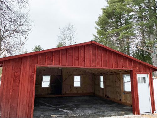 Stained Board & Batten Garage with Alaskan Slab